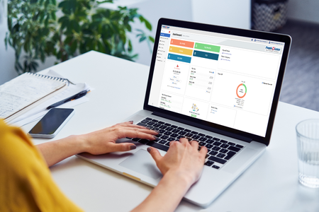 User on Laptop with PRO Dashboard Screen