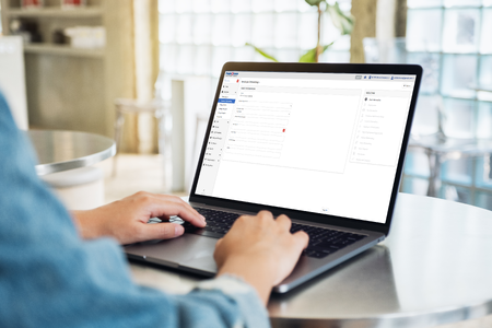 User on Laptop with Onboarding Screen