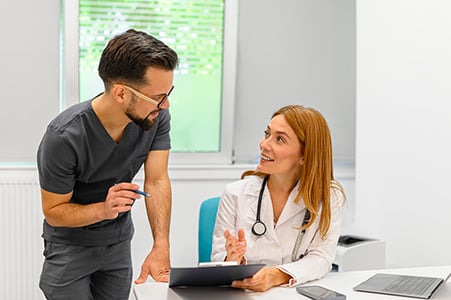Eye Doctor and Person Conversing