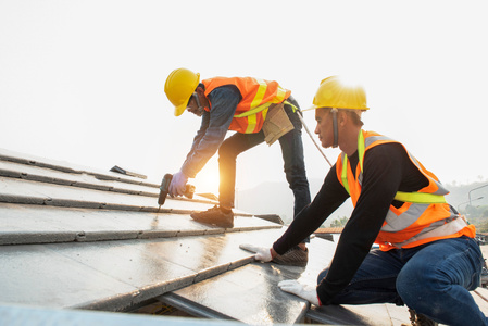 Construction Workers On a Roof